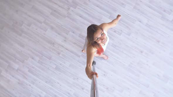 Woman Exercise Pole Dance. Top View. Hot Sexy Girl Dancing. Slow Motion