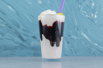 Delicious cocoa milk shake ,on the marble background