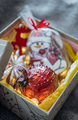 Seasonal handmade gift box with Christmas toys, treats, Christmas decor.Top view - PhotoDune Item for Sale