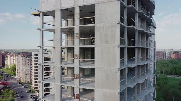 Aerial view of high residential apartment building under construction. Real estate development. / Videohive, Stock footage, Buildings