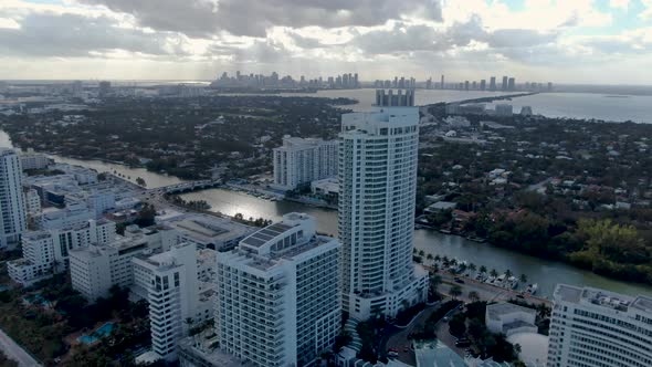 Aerial View Of Luxury Hotel Buildings Lining The Shore Of Mid-Beach Area In Miami Beach, Florida. dr