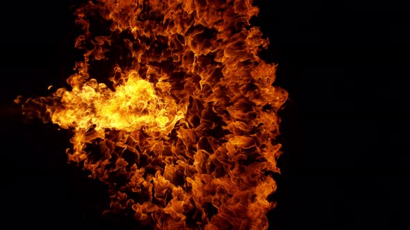 Super Slow Motion Shot of Fire Explosion Against the Black Wall at 1000Fps.