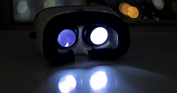 VR device playing movie at night 