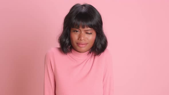 Anxious Woman Looks with Fright and Anticipation of Something Bad Happen