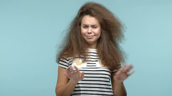 Close Up of Glamour Girl with Wavy Long Hair and Striped Tshirt Shaking Head and Saying No Rejecting