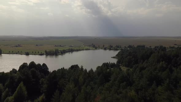 Flight Over Forest And Lake