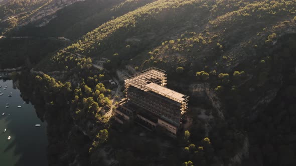 Building under construction near river