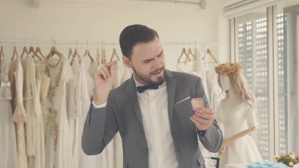 Funny Groom Man Wearing Wedding Clothes Dance in Dressing Room