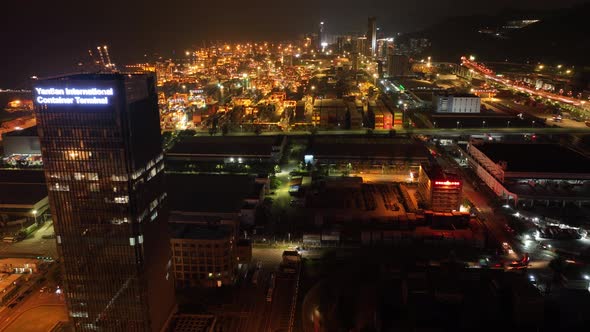 Aerial footage of Yantian container terminal at night in Shenzhen city, China, Hyperlapse alt