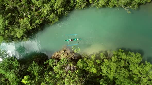 Aerial view of traditional fishing boat in Bojo River, Aloguinsan, Philippines.