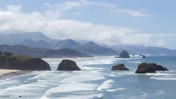 Time Lapse of Waves Crashing the Beach on The Seashore at The Oregon Coast in Pacific Northwest