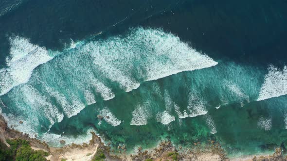 Waves Splashing Towards a Beautiful Rocky Island
