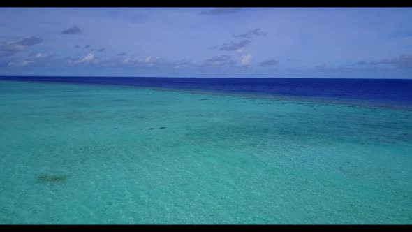 Aerial drone shot sky of luxury sea view beach break by transparent water with white sand background