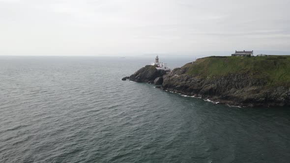 Unearthly island Howth head Baily lighthouse at peak aerial