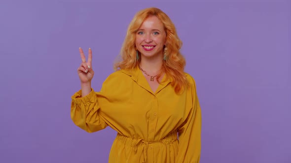 Pretty Stylish Smiling Girl Showing Victory Sign Hoping for Success and Win Doing Peace Gesture