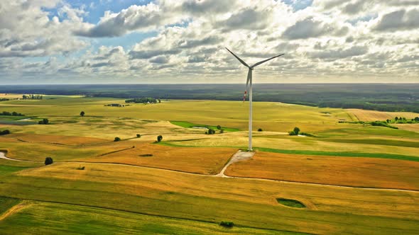 Wind turbines on field in summer Poland, aerial view