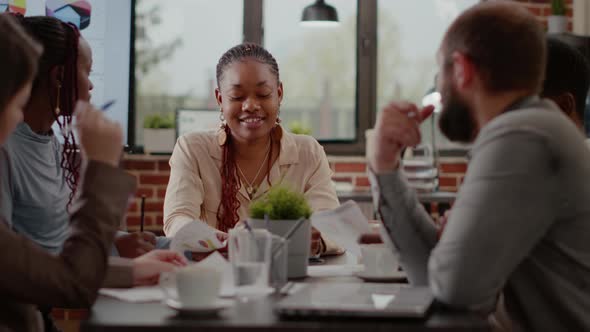 Close Up of Company Worker Planning Business Strategy with Colleagues