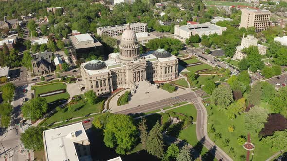 Wide aerial shot approaching Idaho State's Capitol Building.