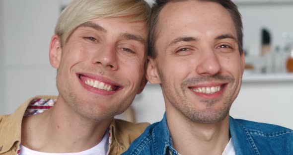 Closeup of Happy Young Gay Couple at Home