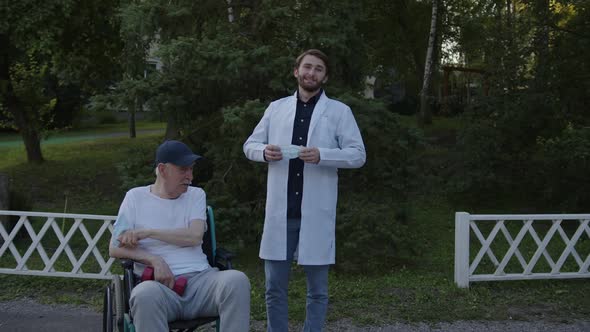 Doctor and Patient Happily Take Off Their Medical Masks