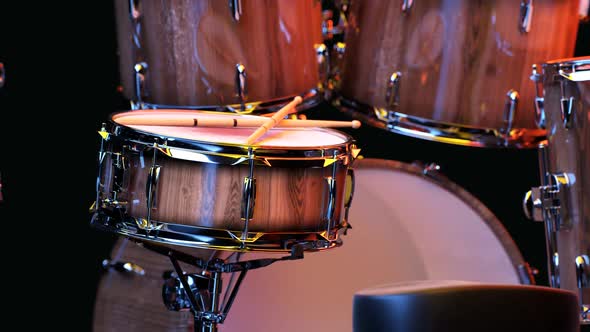 Bright wood drum kit on a black background. Turkish, handmade, bronze cymbals.4K