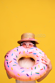 ring on yellow background. inflate an inflatable circle