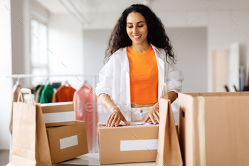 Woman Fashion Designer Packing Carton Boxes For Delivery At Shop