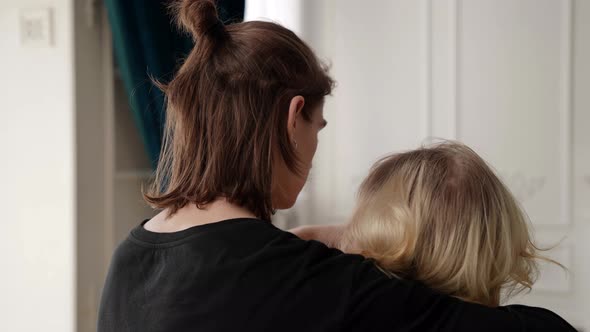 Loving Couple is Dancing Indoors Young Man is Embracing His Beloved Girlfriend