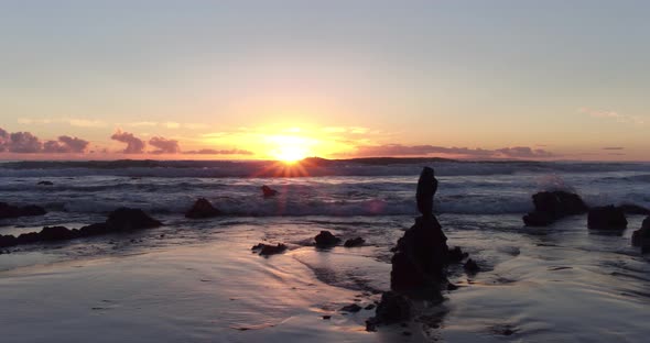 Rockey Sunset Surfing