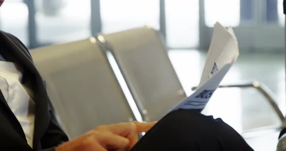 Businessman reading a newspaper