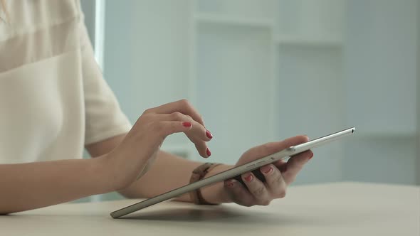 Woman Using Tablet, Browsing Internet