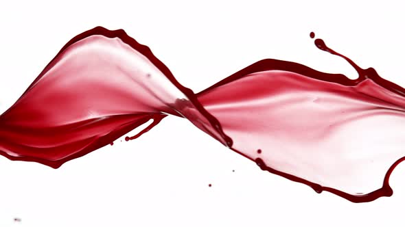 Super Slow Motion Shot of Red Wine Spiral Splash Isolated on White Background at 1000Fps