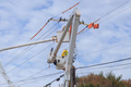 Handling damage caused by hurricane requires dedicated efforts of service men working on power a - PhotoDune Item for Sale