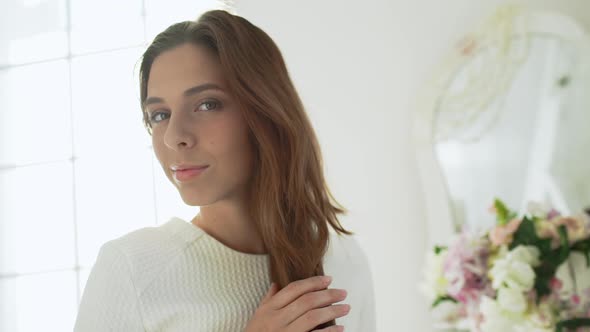 Young Beautiful Girl in White Decor