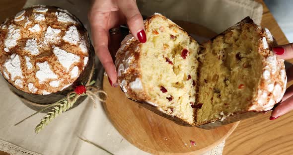 Happy Easter, Woman cut Easter cake for the holiday