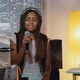 Beautiful Black Woman Emotionally Performing a Song During Her Band Rehearsal in Home Studio - VideoHive Item for Sale