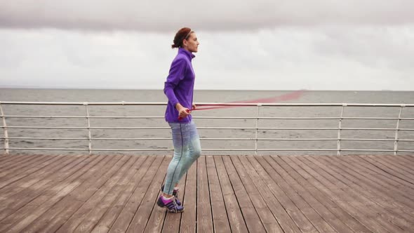 High Pace Video Young Woman Working Out on the Jump Rope