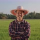 Slow motion Portrait Happy Asian Farmer arms crossed smiling and looking at camera. - VideoHive Item for Sale