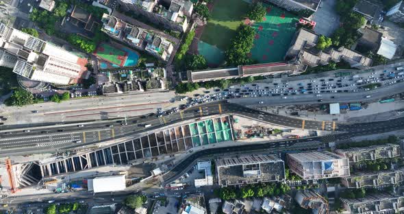 Aerial footage of landscape and traffic jam during morning rush hour in downtown of shenzhen city