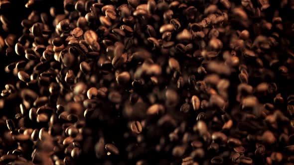 The Super Slow Motion of the Coffee Beans Soars Up and Falls