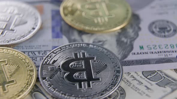 Bitcoin Coins Lie on Dollars