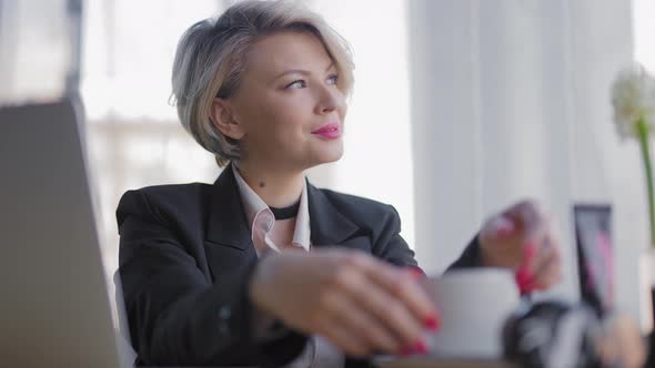 The Business Woman Took a Coffee Break