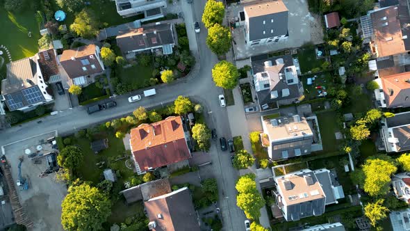 Birdseye aerial view suburban munich. drone flying top down over middle class family houses with sma