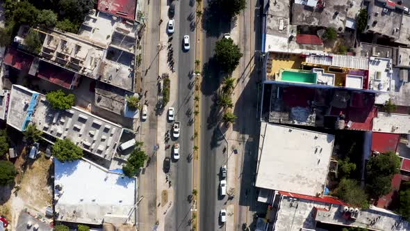 Aerial View of the Street Intersection with Cars Driving Down the Streets