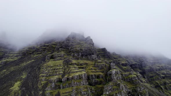 Drone Flight Towards Mountain Peak In Mist