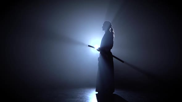 Man Fighting at Aikido Training with Japanese Sword in Martial Arts School. Healthy Lifestyle and