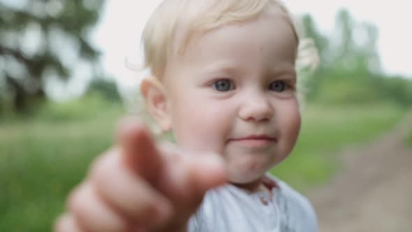 portrait of a child in the park. crying baby . parenting concept. alt