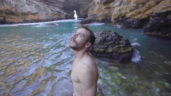 Young man on the seashore.