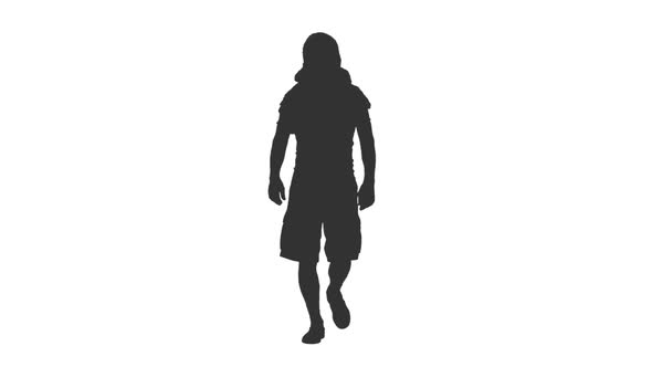 Silhouette of Man Tourist Walking in Shorts and Arabic Scarf