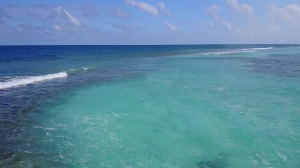 Aerial drone abstract of exotic tourist beach by water with sand background